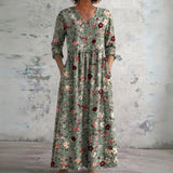 Glenda sage green maxi dress with scattered florals, front view