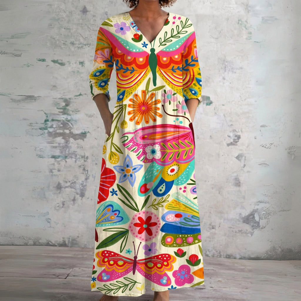 Leila cream maxi dress with butterflies and folk art, front view