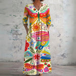 Leila cream maxi dress with butterflies and folk art, front view