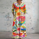 Leila cream maxi dress with butterflies and folk art, front view