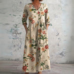 Cassie cream maxi dress with climbing botanicals, front view