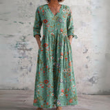 Gwen teal maxi dress with fine florals, front view
