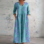 Thea teal maxi dress with lavender leaves, front view