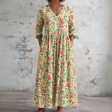 Joanna cream maxi dress with fine green florals, front view