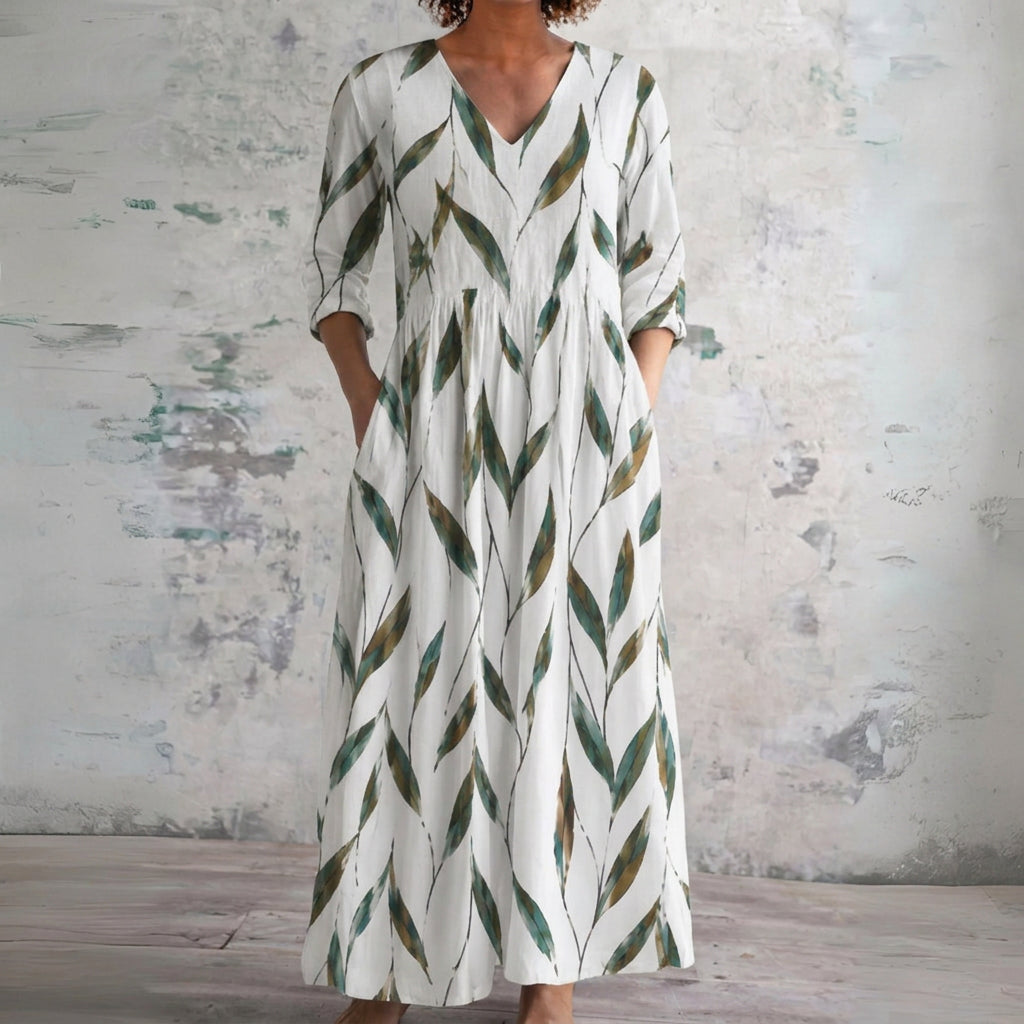 Tess white maxi dress with green leaf sprigs, front view