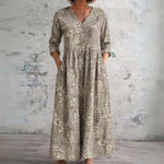 Trudy taupe maxi dress with sketched meadow florals, front view