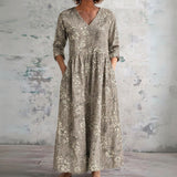 Trudy taupe maxi dress with sketched meadow florals, front view