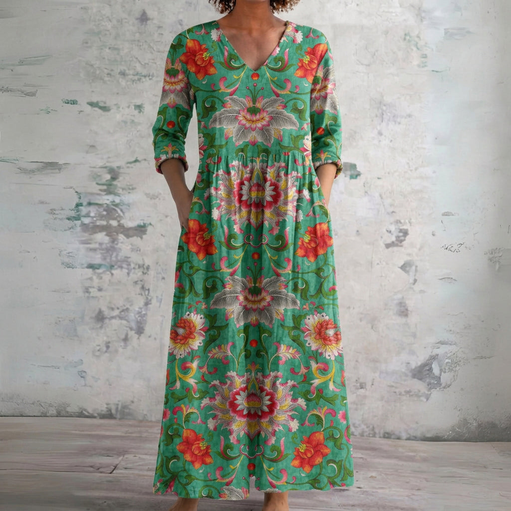 Kristy green maxi dress with red folk florals, front view
