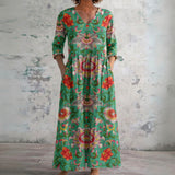 Kristy green maxi dress with red folk florals, front view