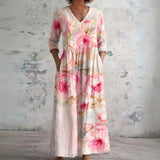 Sara blush maxi dress with soft roses, front view