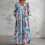 Caitlin blue maxi dress with birds and blooms, front view