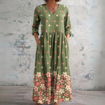 Libby green maxi dress with pink floral border, front view
