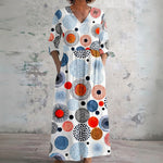 Penny white maxi dress with mosaic circles, front view