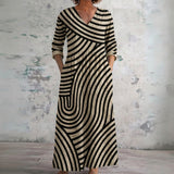 Nadia black and cream curved stripe maxi dress, front view