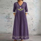 Sue purple maxi dress with embroidered thistle, front view
