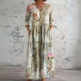 Jan sage maxi dress with single rose, front view