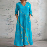 Liv turquoise maxi dress with golden branch, front view