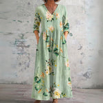 Bec sage green maxi dress with soft florals, front view