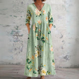 Bec sage green maxi dress with soft florals, front view
