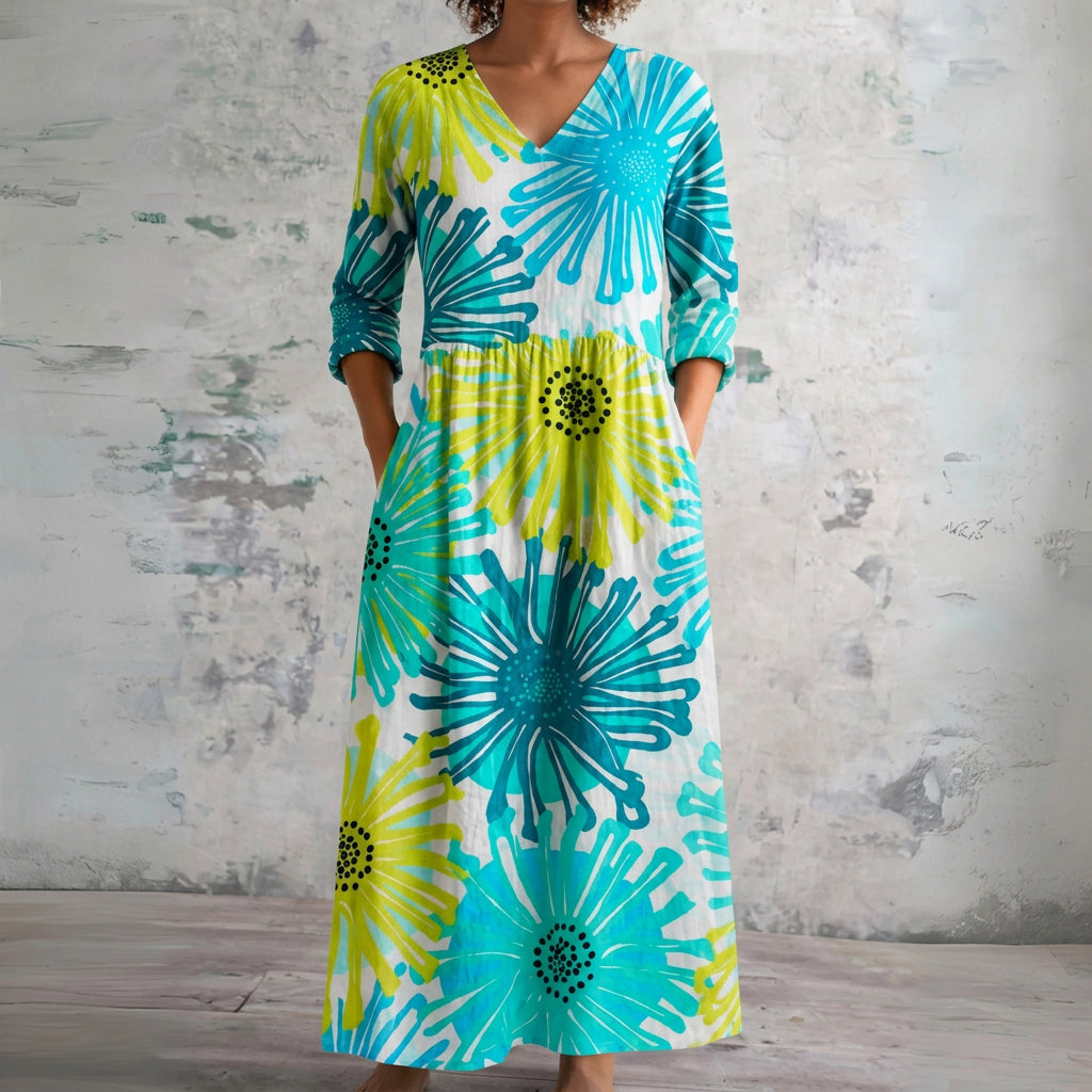 Shannon turquoise maxi dress with dandelion bursts, front view