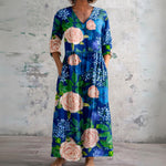 Rene navy maxi dress with blush roses, front view