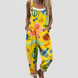 Shelby - Yellow Overalls with Insect and Flower Print